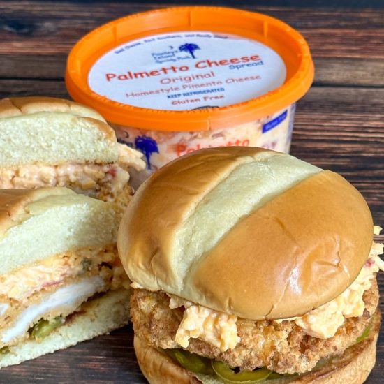 Palmetto brand homestyle cheese spread in orange container with prepared sandwiches for wholesale food service distribution.