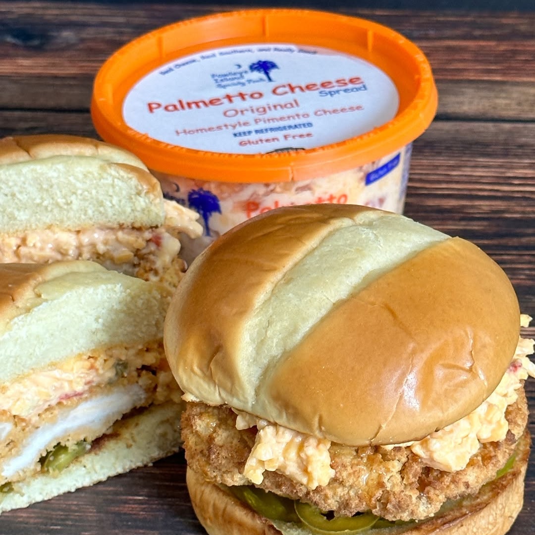 Palmetto brand homestyle cheese spread in orange container with prepared sandwiches for wholesale food service distribution.